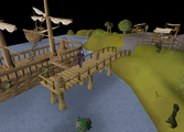 Veos's ship docked in a jetty in Draynor Village.