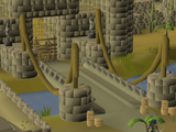 The heavily barricaded bridge over the River Elid connecting the two cities, guarded by Coenus and his men.