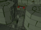 An inaccessible stone chest containing two dragon warhammers, between the second and third shaman chambers.