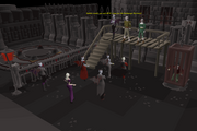An auctioneer selling slaves in the Darkmeyer Auctions.
